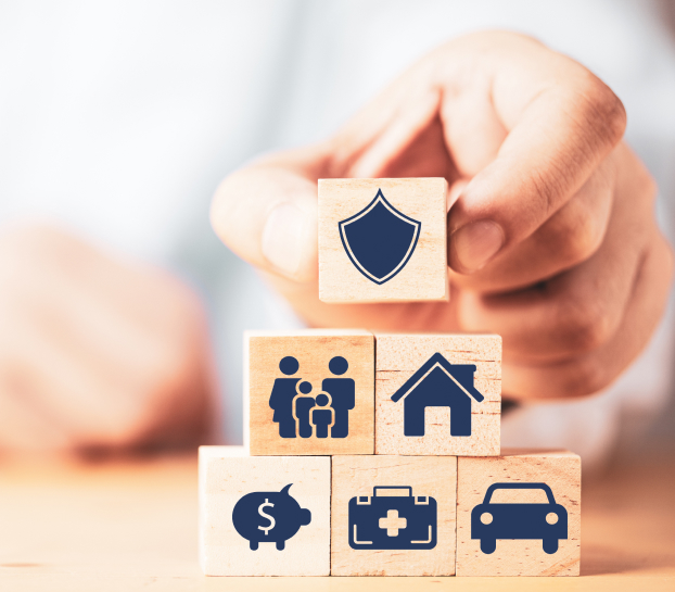 Hand holding coins, representing customizing general liability coverage options.